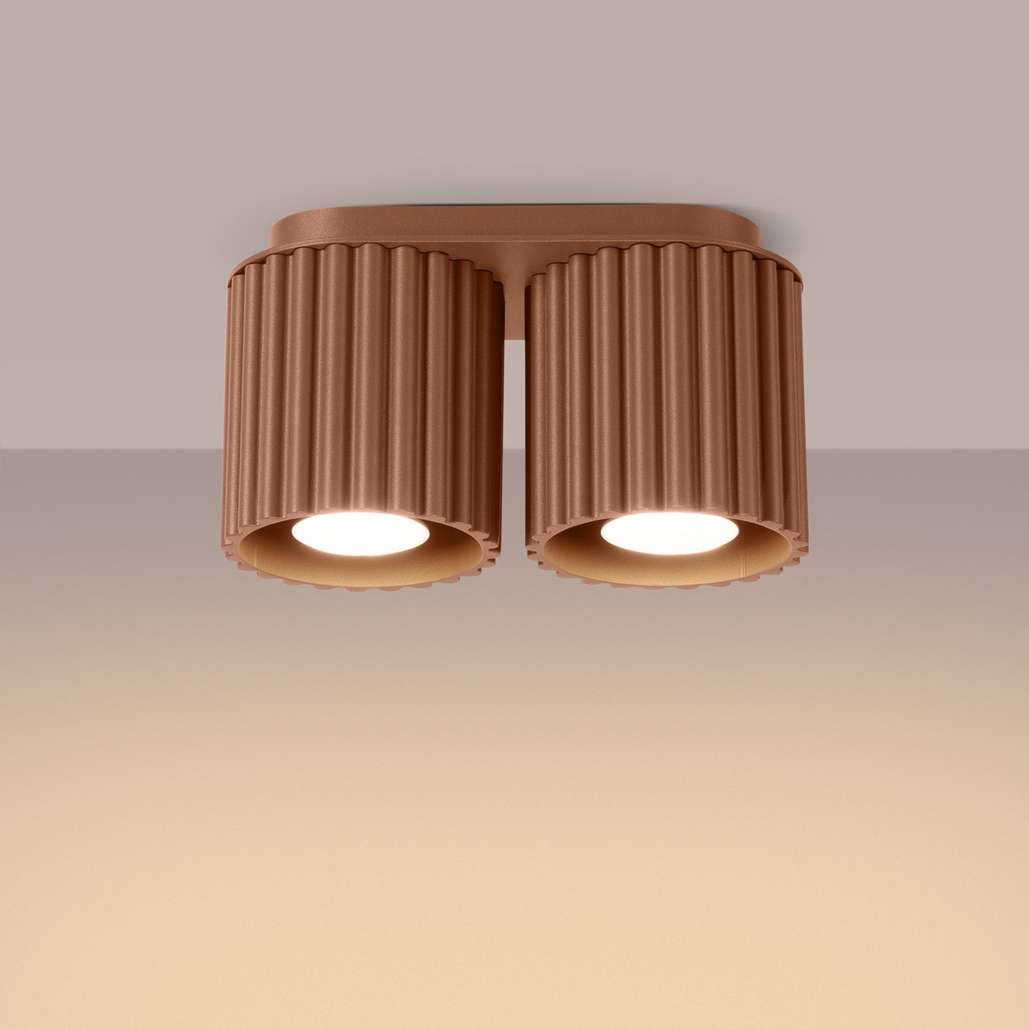 Mocha Twin Cube Surface Spotlight Bar switched on in modern UK home interior, warm LED glow