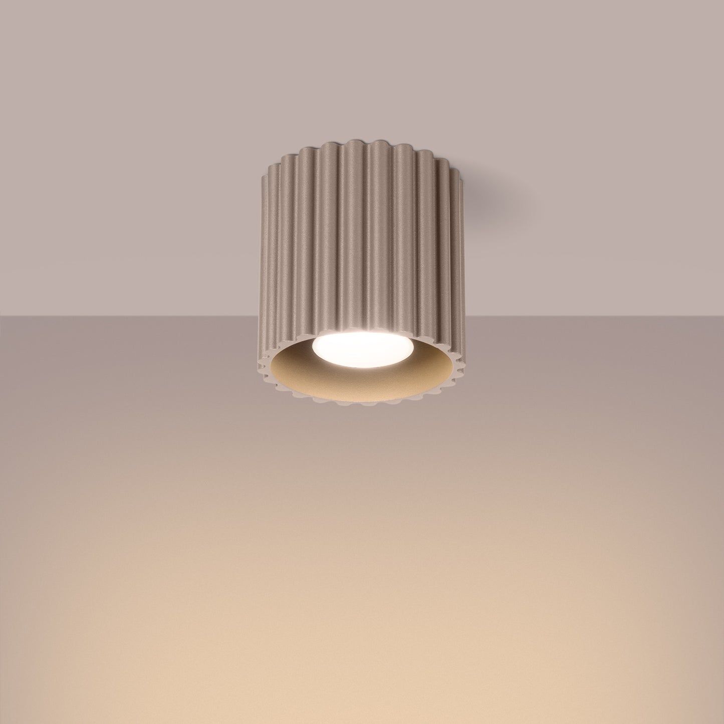 Taupe Square Cube Surface Spotlight switched on in modern UK home interior, warm LED glow