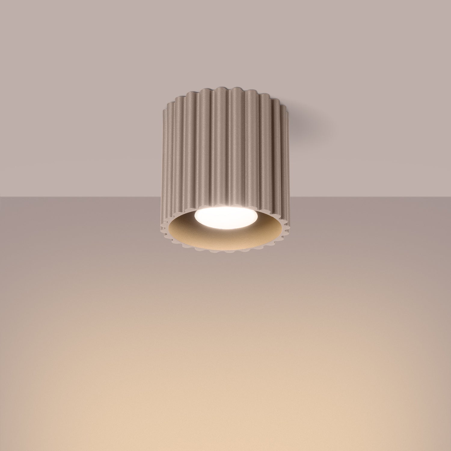 Taupe Square Cube Surface Spotlight switched on in modern UK home interior, warm LED glow