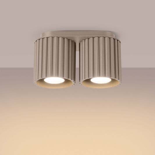 Taupe Twin Cube Surface Spotlight Bar switched on in modern UK home interior, warm LED glow