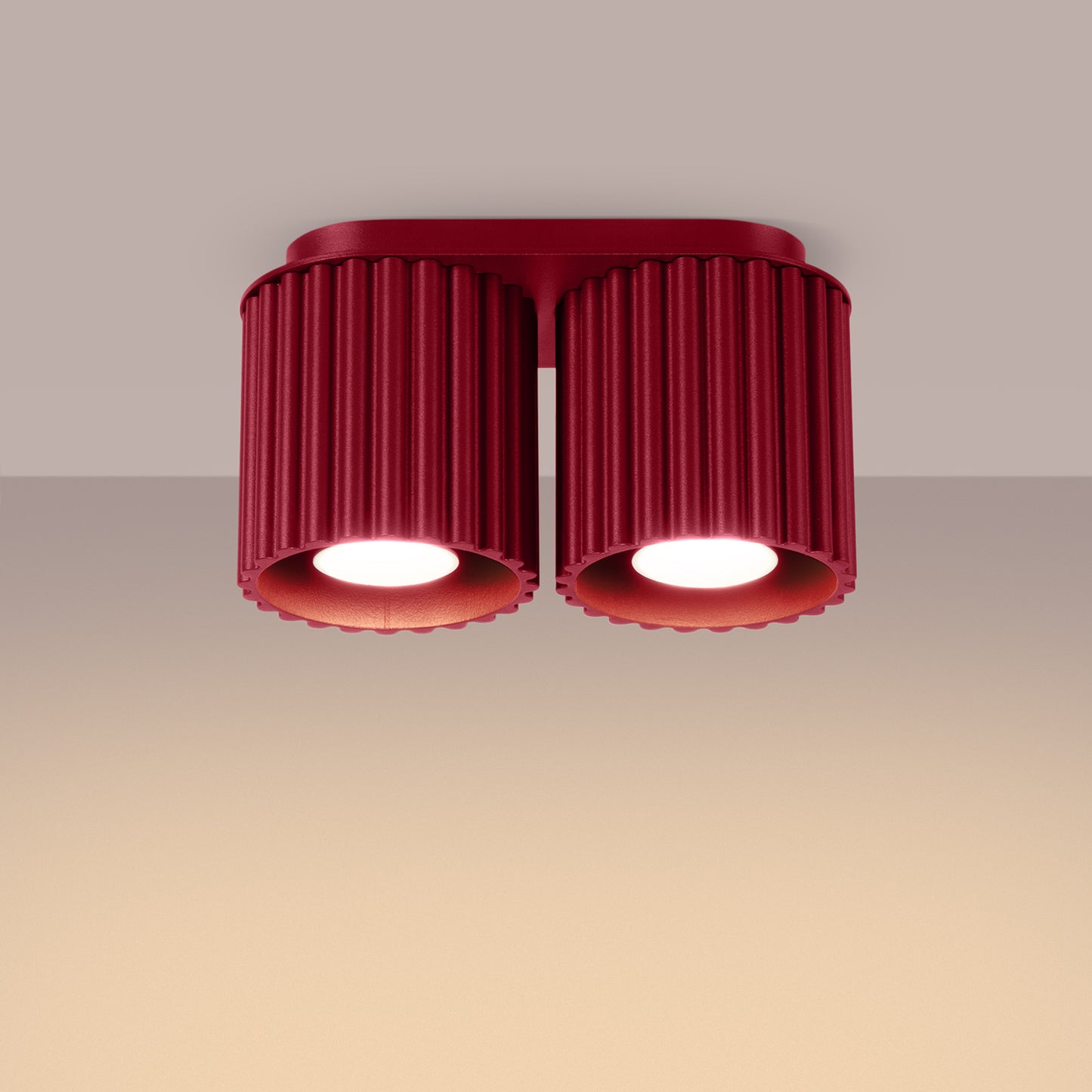 Burgundy Twin Cube Surface Spotlight Bar switched on in modern UK home interior, warm LED glow