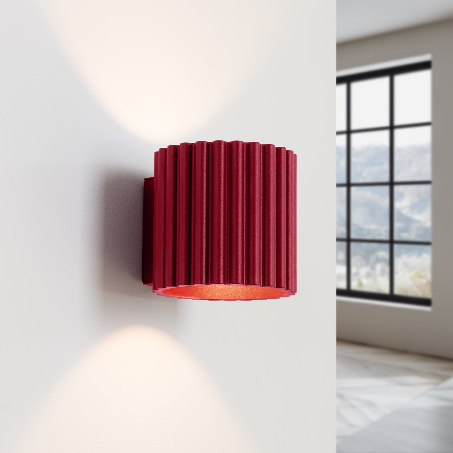 Burgundy Square Up Down Wall Light switched on in modern UK home interior, warm LED glow
