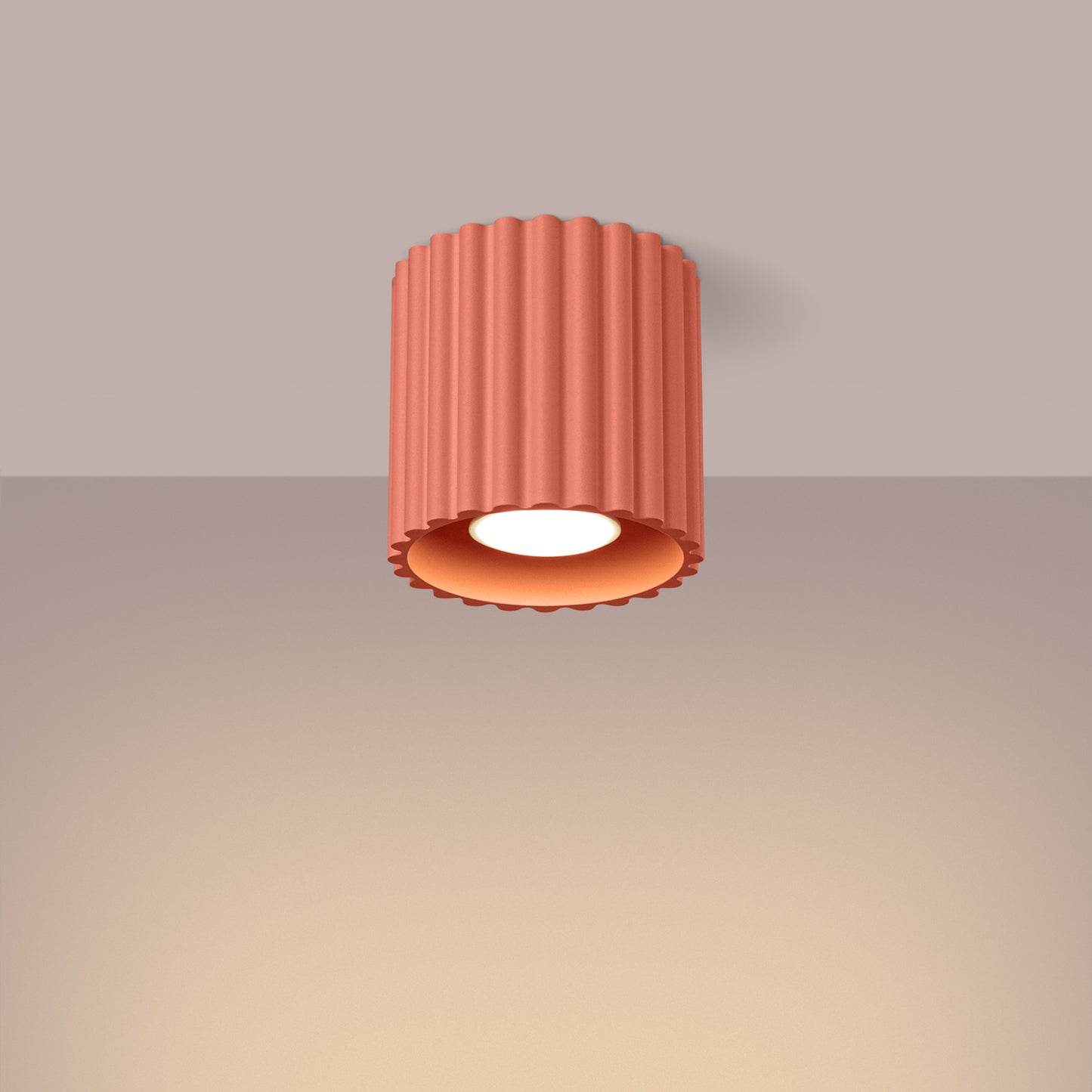 Peach Square Cube Surface Spotlight switched on in modern UK home interior, warm LED glow