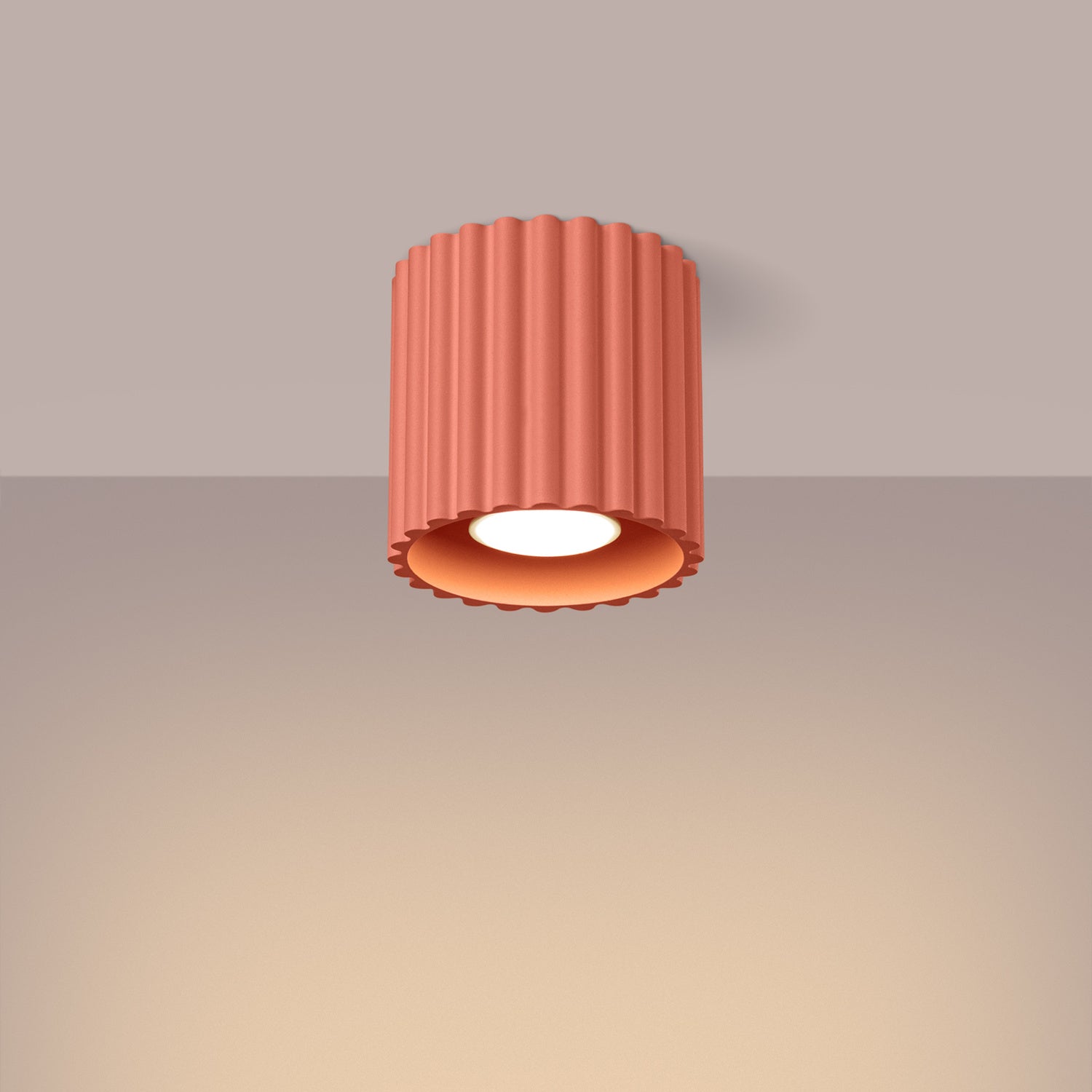 Peach Square Cube Surface Spotlight switched on in modern UK home interior, warm LED glow
