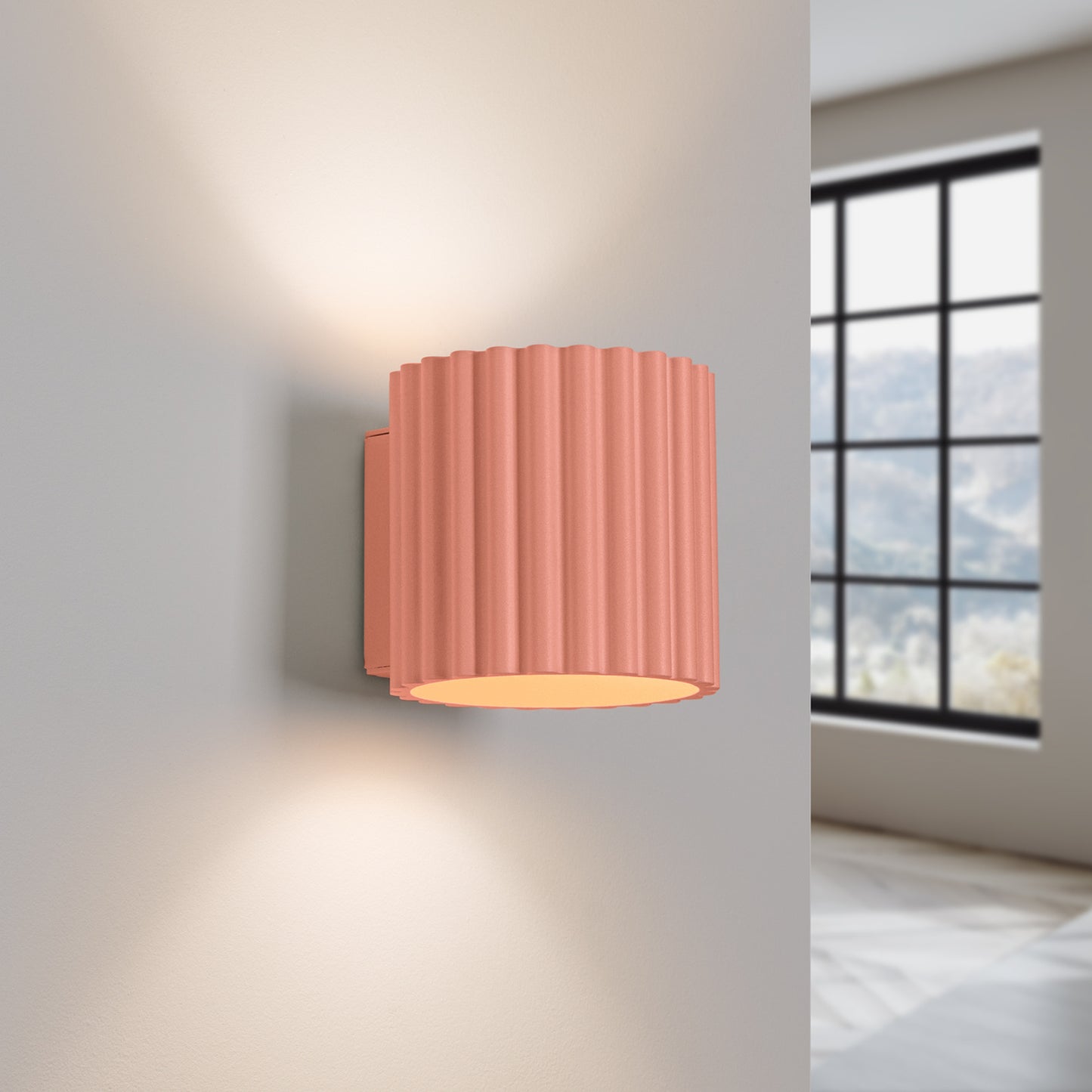 Peach Square Up Down Wall Light switched on in modern UK home interior, warm LED glow