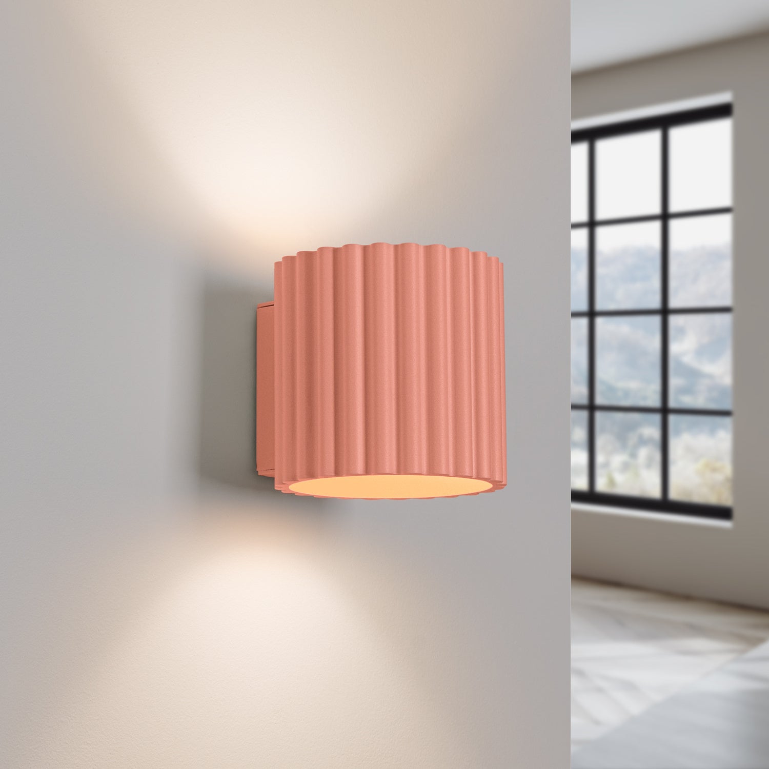 Peach Square Up Down Wall Light switched on in modern UK home interior, warm LED glow