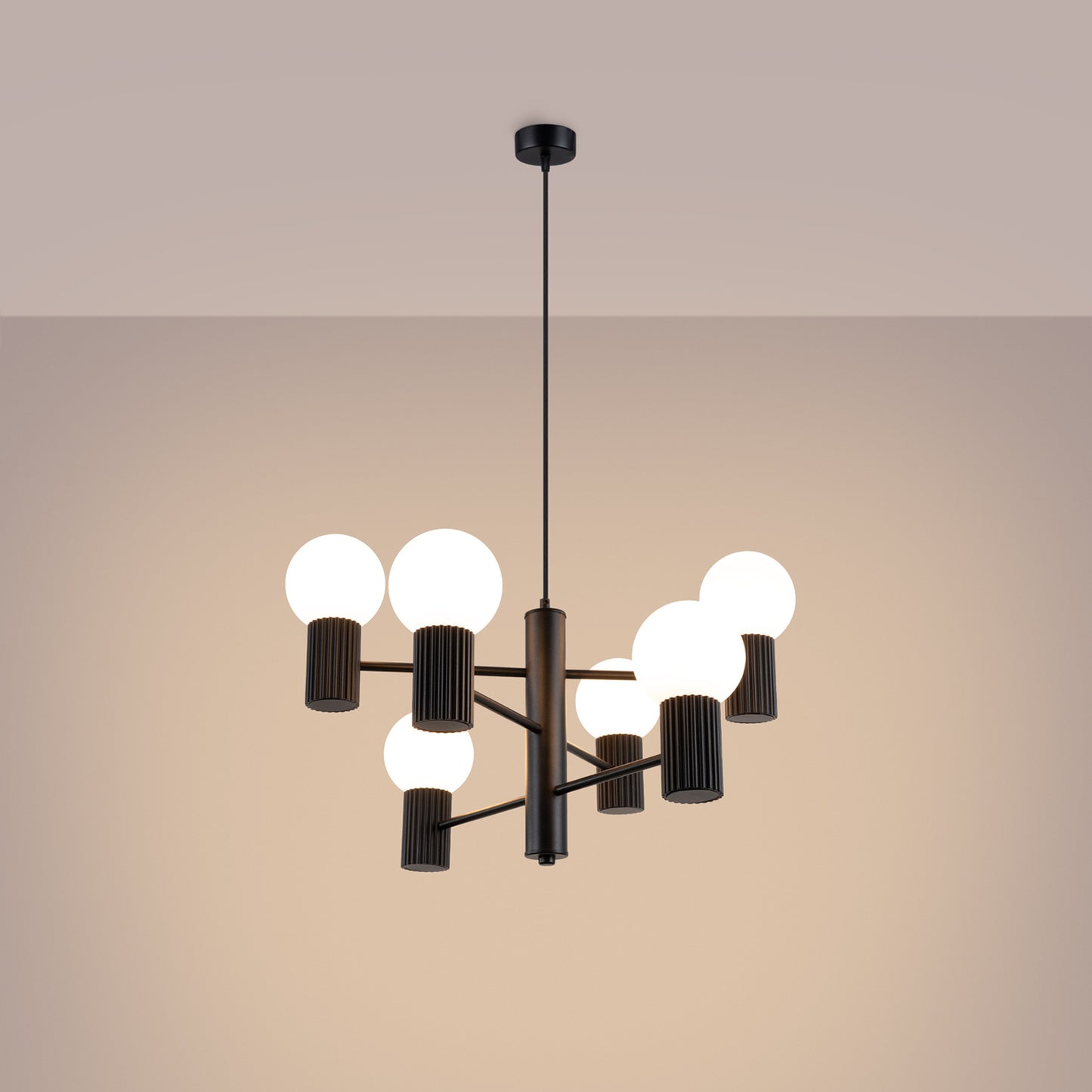 Black 6 Light Glass Globe Chandelier switched on in modern UK home interior, warm LED glow