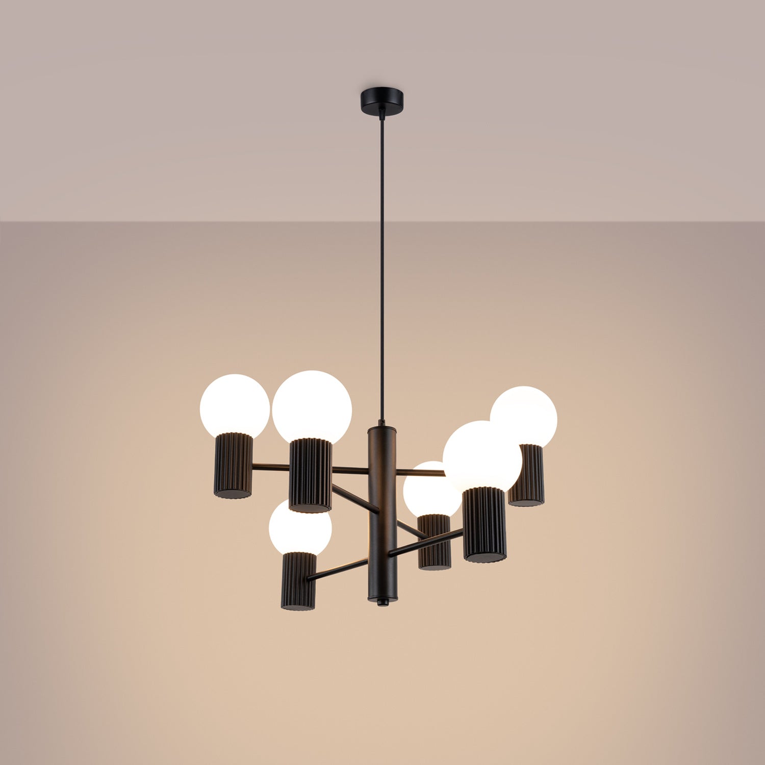 Black 6 Light Glass Globe Chandelier switched on in modern UK home interior, warm LED glow