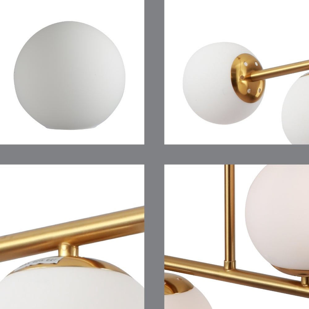 Close up detail of gold 4 Opal Globe Cluster Ceiling Light showing premium finish, material texture and bulb fitting