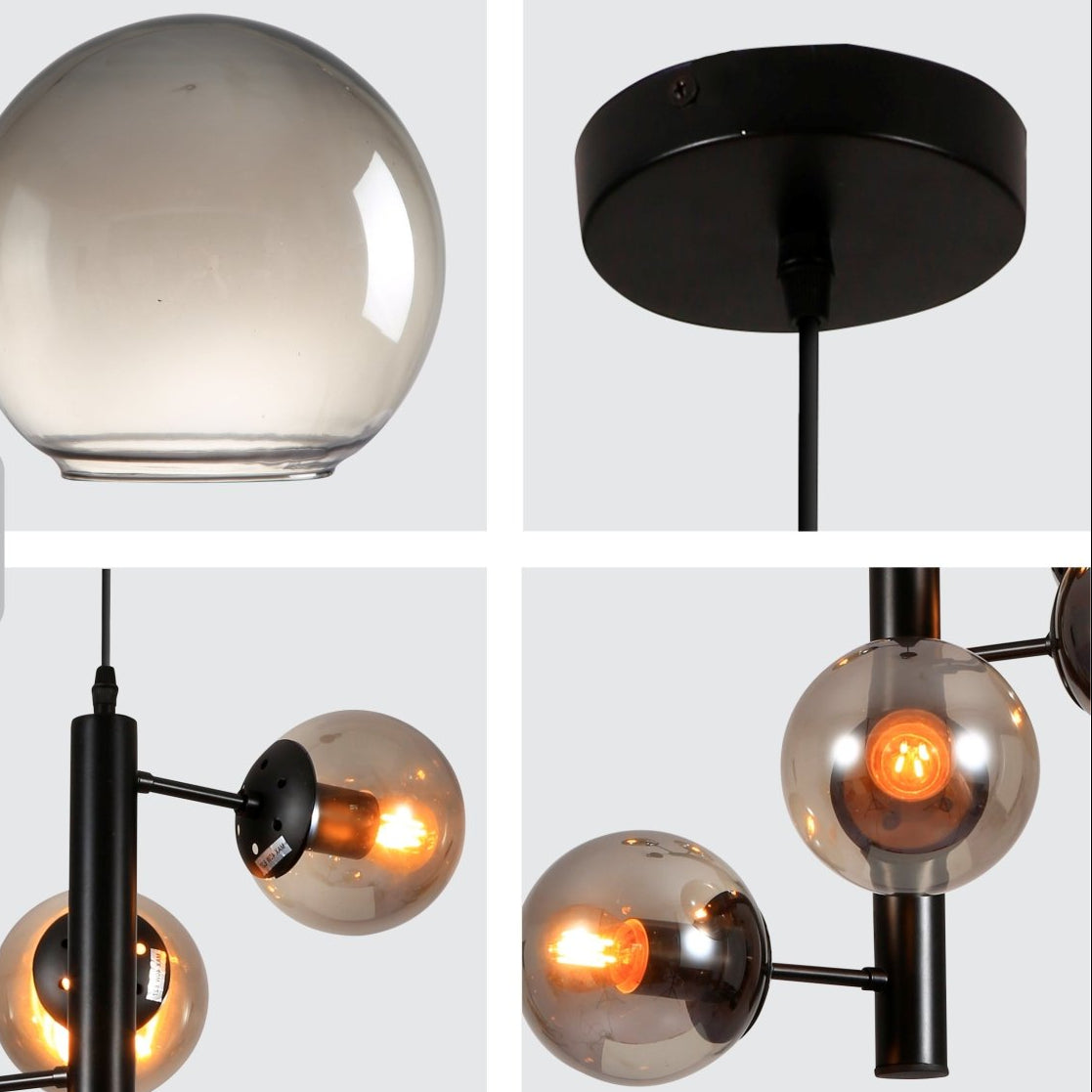 Close up detail of black Spiral 6 Globe Sputnik Chandelier showing premium finish, material texture and bulb fitting