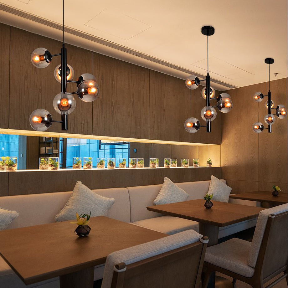Black Spiral 6 Globe Sputnik Chandelier installed in modern UK home interior with warm LED glow, contemporary lighting design