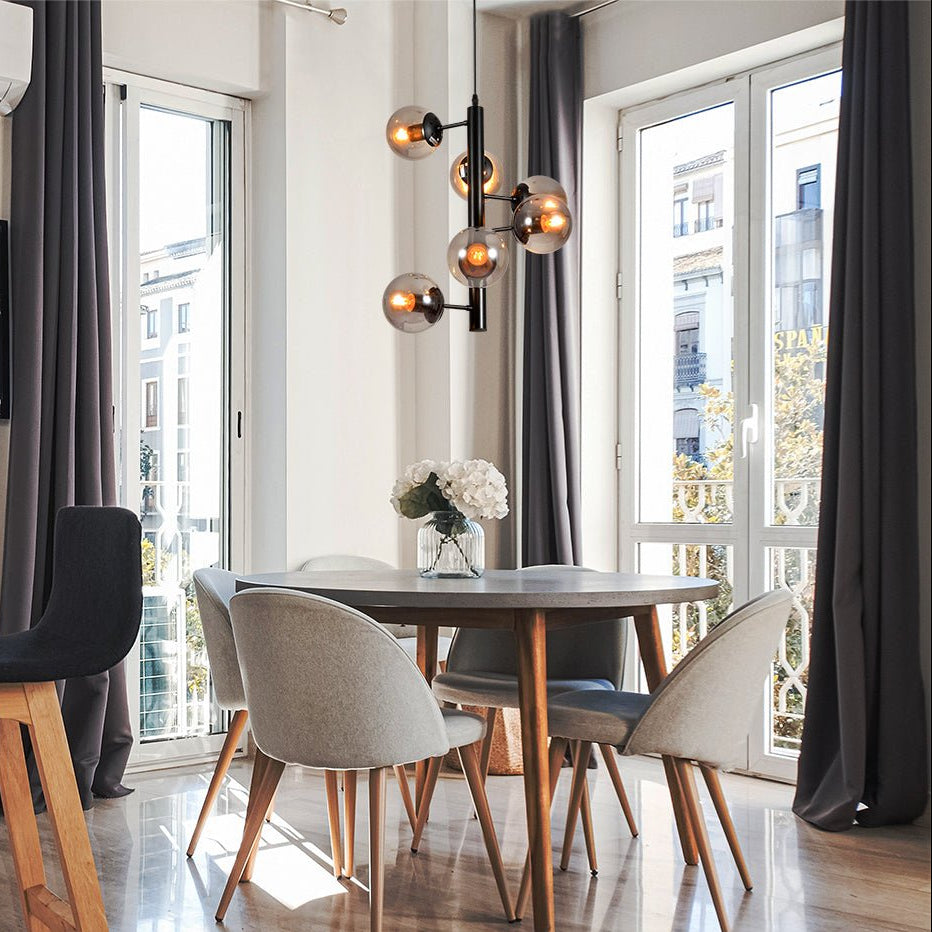 Black Spiral 6 Globe Sputnik Chandelier installed in modern UK home interior with warm LED glow, contemporary lighting design