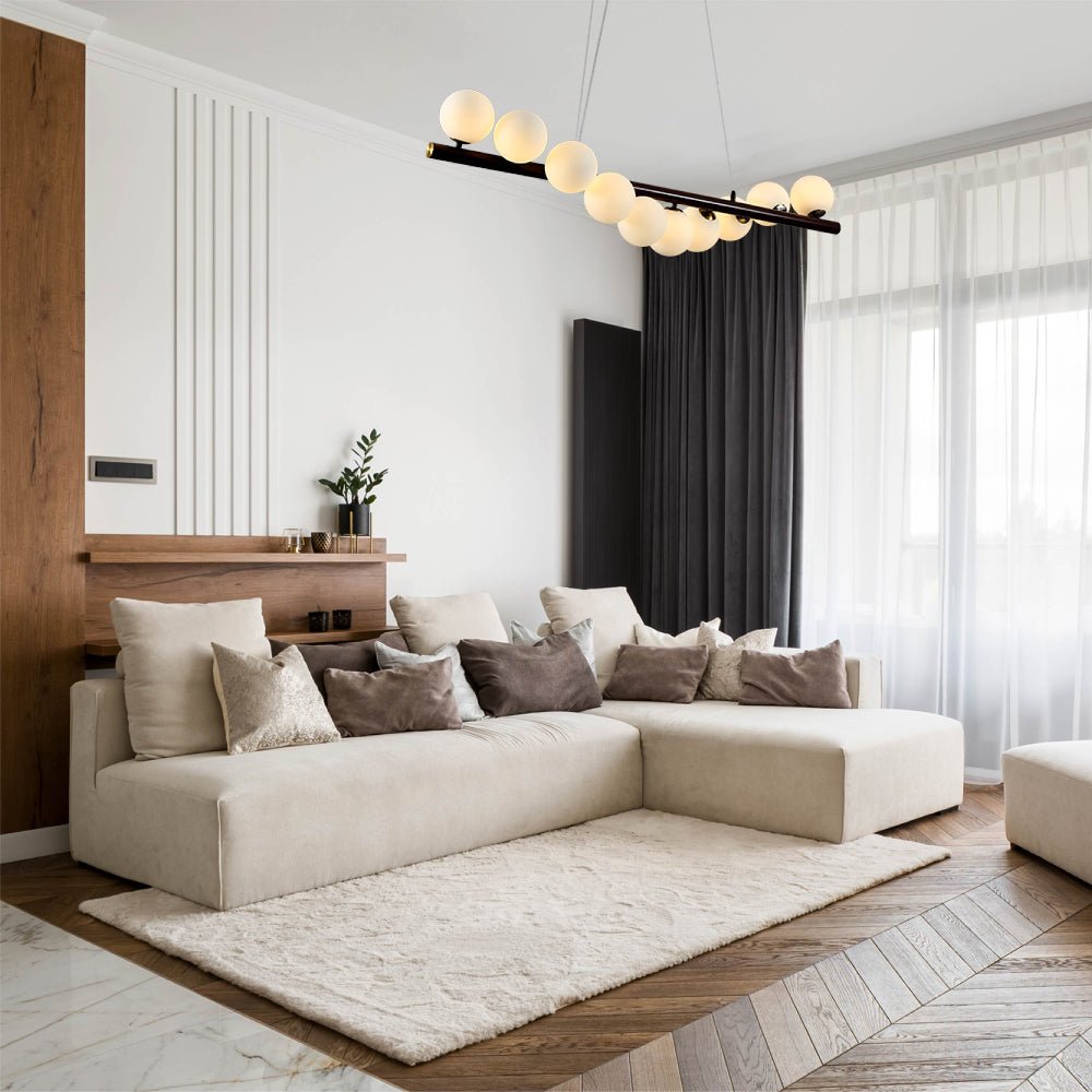 Walnut Wood 10 Opal Globe Linear Bar Chandelier installed in modern UK home interior with warm LED glow, contemporary lighting design