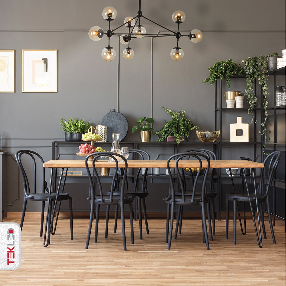 Black 10 Amber Globe Molecule Chandelier installed in modern UK home interior with warm LED glow, contemporary lighting design